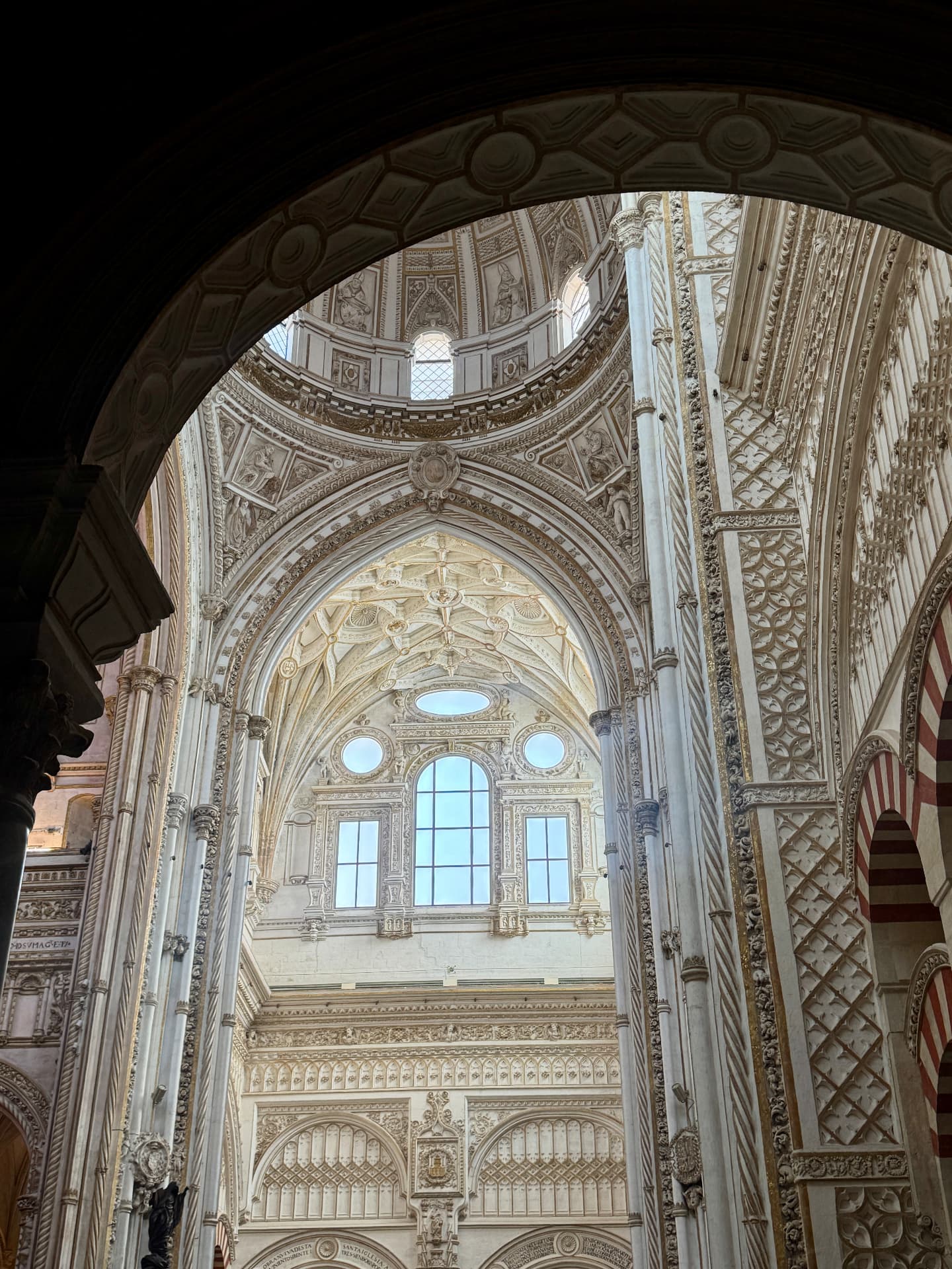 Ornate arches and stonework inside a cathedral